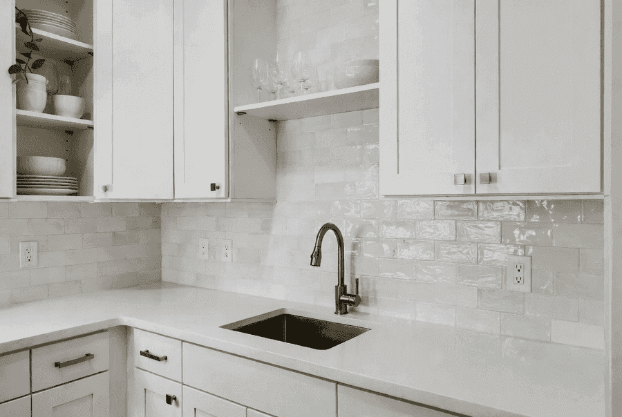 Right backsplash tiles making a small kitchen shine